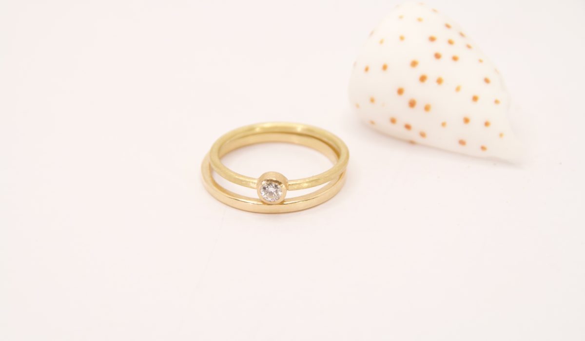 Brillantring, 750Au, mit Beisteckring